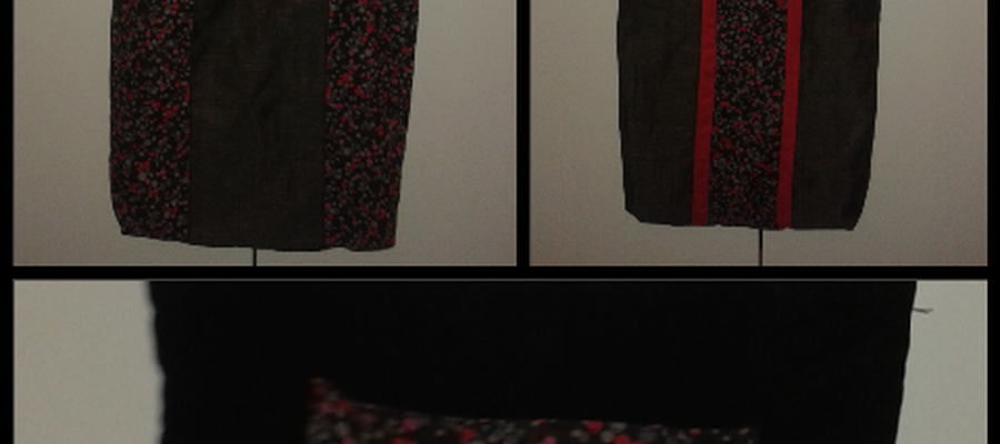 Kotoizko poltsa gris eta loreduna. Alde bakoitzeko diseinu bat du.